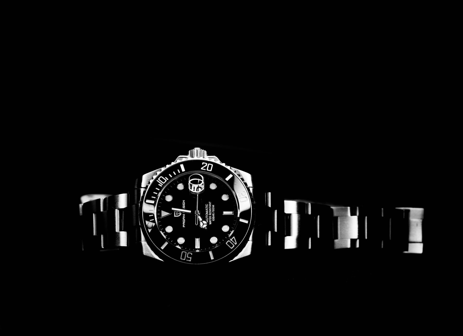 Monochrome close-up of a luxury wristwatch
