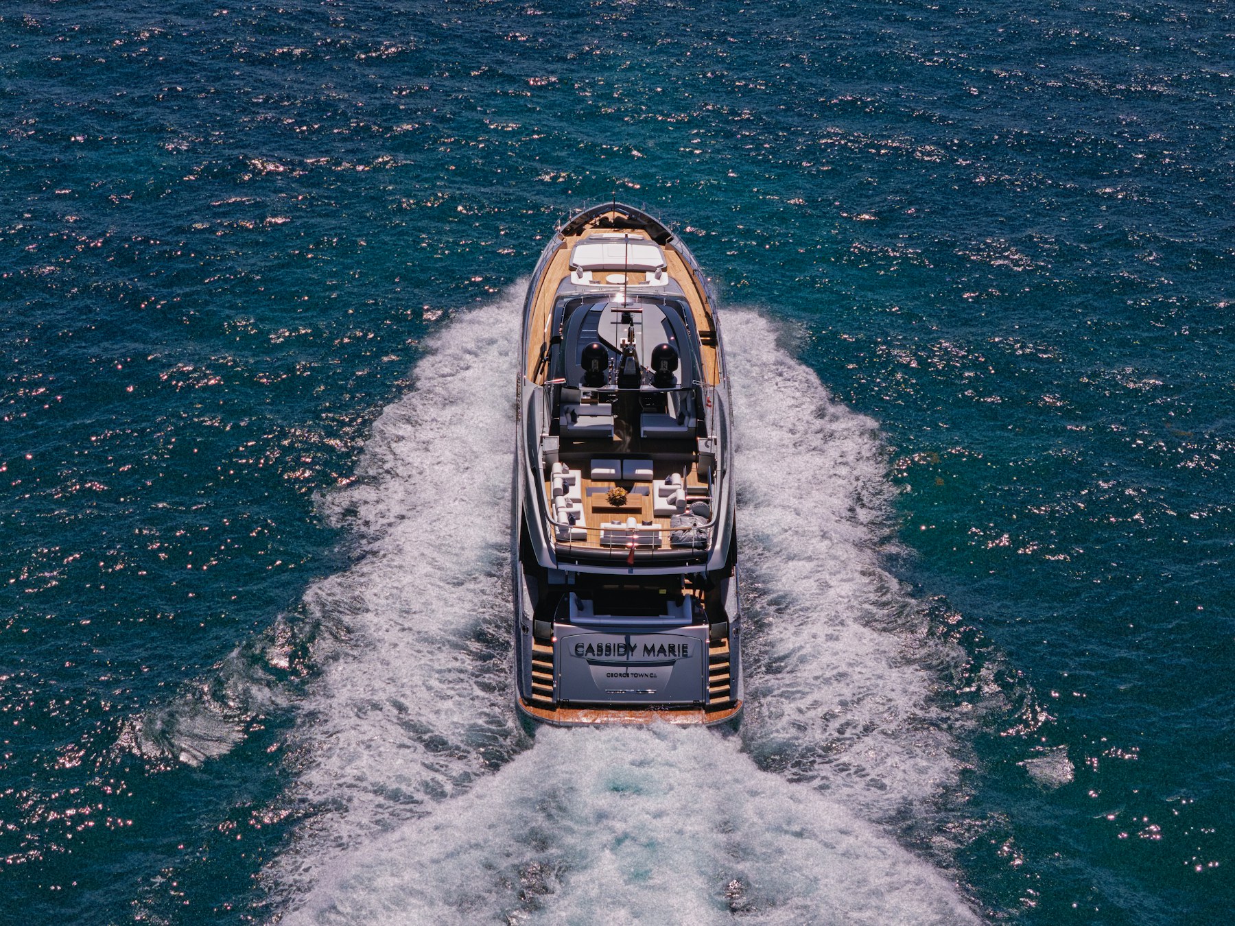 Luxury motor yacht cruising through deep blue water